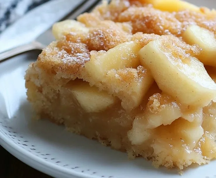 Three ingredients apple cake ready to serve, showcasing its delicious texture and flavor.
