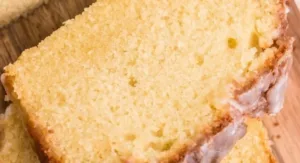 Apple Cider Pound Cake 2 Slice of moist Apple Cider Pound Cake on a plate with autumn leaves