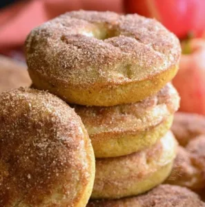 Apple Pie Baked Doughnuts 5 Freshly baked Apple Pie Doughnuts topped with cinnamon sugar and a drizzle of icing.