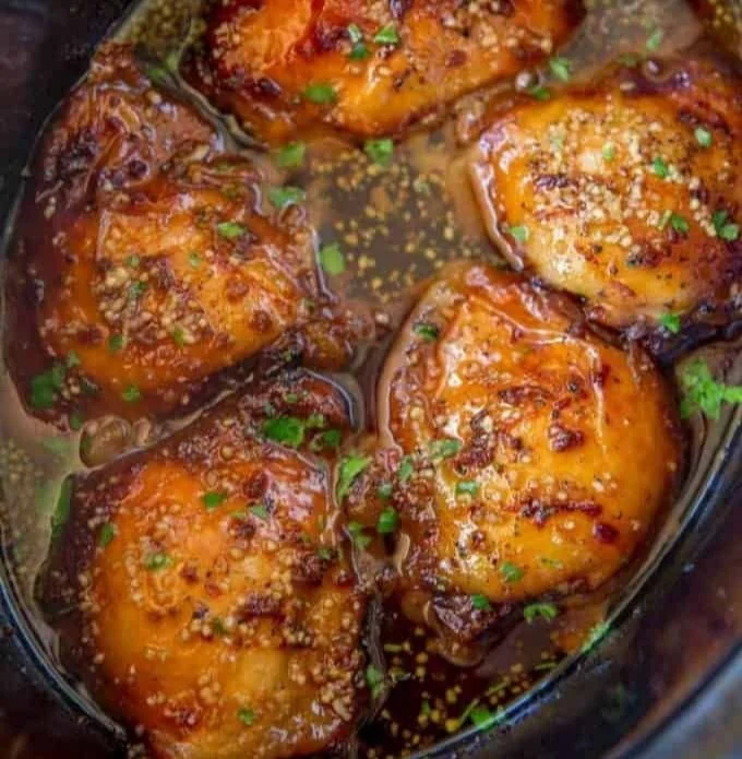 Slow cooker Brown Sugar Garlic Chicken garnished with green onions