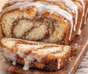 Cinnamon Bread Quick and Fluffy 4 Fluffy cinnamon bread fresh out of the oven, perfect for breakfast.