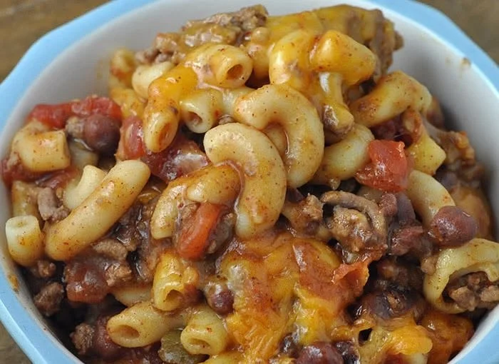 Crock Pot Cheddar Chili Mac with cheese and chili in a bowl