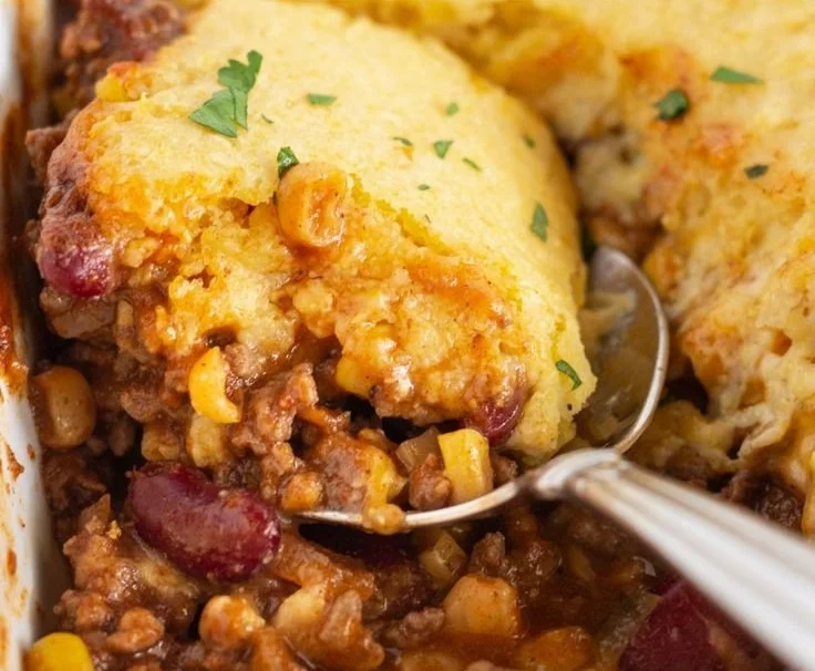 Delicious cowboy cornbread casserole in a baking dish ready to serve