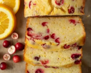 Orange Cranberry Bread Recipe 2 Slice of orange cranberry bread topped with orange zest