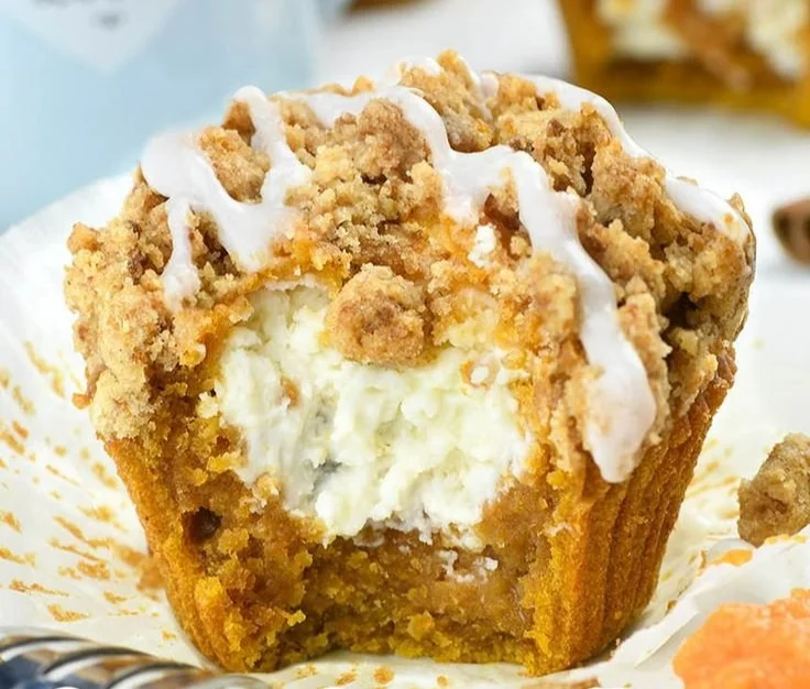 Delicious Pumpkin Cream Cheese Muffins freshly baked and ready to enjoy.