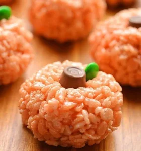 Rice Krispie Treat Pumpkins 3 Halloween-themed Rice Krispie Treat Pumpkins shaped like festive pumpkins