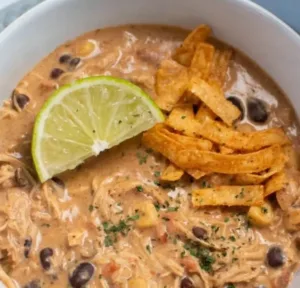 Slow Cooker White Chicken Chili with Cream Cheese 6 Bowl of creamy slow cooker white chicken chili with cream cheese