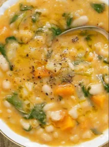 Best White Bean Soup 3 Bowl of the best white bean soup topped with fresh herbs