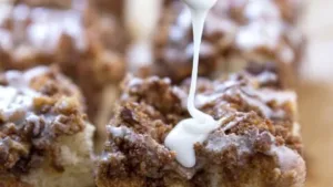 Coffee Cake 4 Delicious homemade coffee cake with a crumbly topping and coffee cup