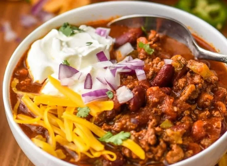 Delicious Crock Pot Chili served in a bowl with toppings