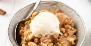 Delicious homemade apple crisp topped with oats and cinnamon.