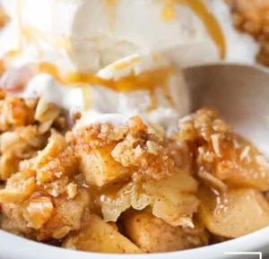 Easy Apple Crisp Recipe with a Perfect Crispy Oat Topping | Thanksgiving desserts apple crisp, Fall dessert recipes apple crisp, Old fashioned apple crisp 3 Delicious apple crisp with a crispy oat topping served in a dessert bowl