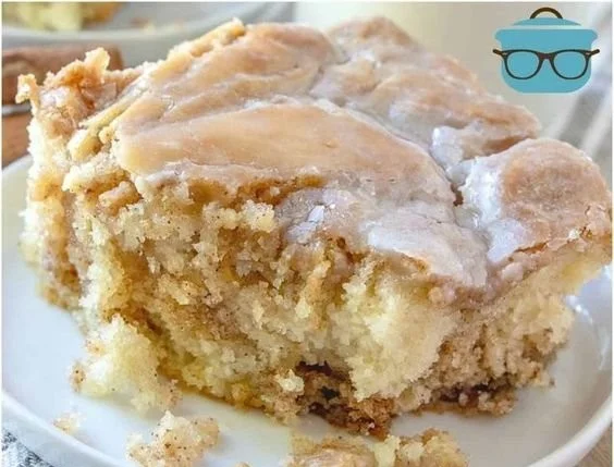 Easy Homemade Cinnamon Roll Cake 2 Delicious homemade cinnamon roll cake with icing on top