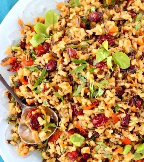 Bowl of easy wild rice pilaf with herbs and vegetables