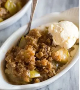 Instant Pot Apple Crisp 2 Instant Pot apple crisp dessert topped with oats and cinnamon