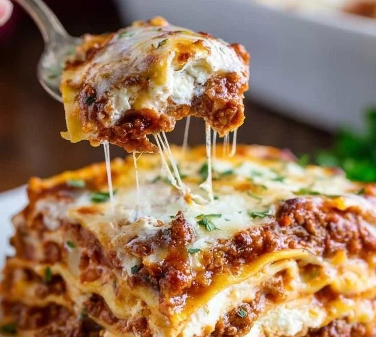 Lasagna 2 Delicious homemade lasagna with layers of cheese, meat, and tomato sauce