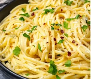 Lemon Butter Garlic Pasta Sauce 6 Delicious Lemon Butter Garlic Pasta Sauce served over pasta.
