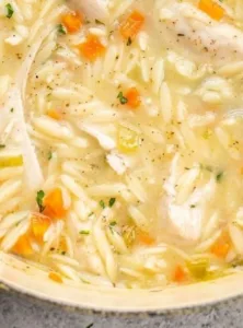 Lemon Chicken Orzo Soup 4 Bowl of Lemon Chicken Orzo Soup with fresh ingredients