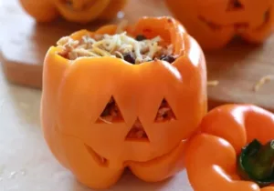Shredded Chicken & Rice Stuffed Peppers (Halloween Style) 4 Halloween-style stuffed peppers with shredded chicken and rice