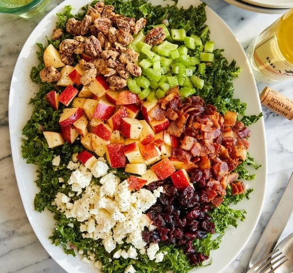 Simple apple cranberry pecan salad with fresh ingredients in a bowl