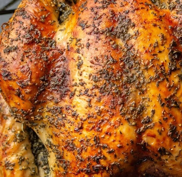 Perfectly roasted turkey ready to be served at a festive gathering.