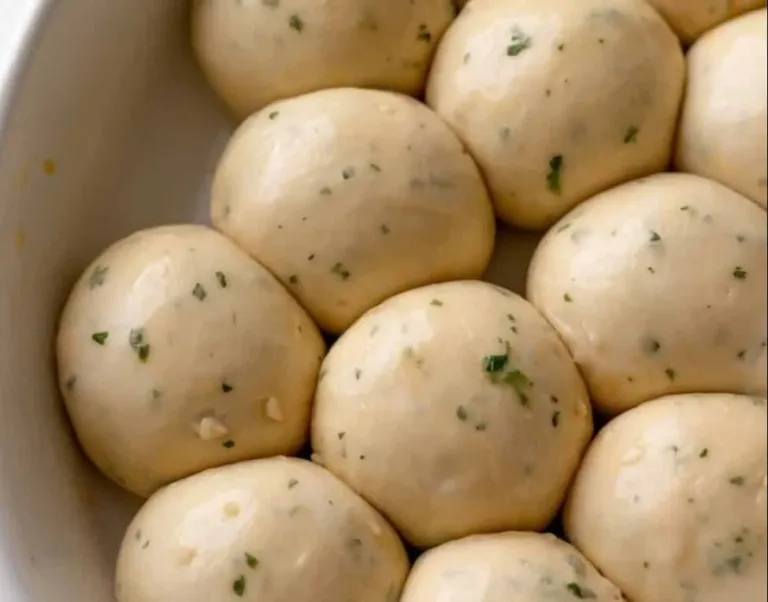Homemade garlic butter rolls served warm on a plate