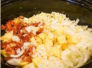 Slow Cooker Potato Soup 5 Bowl of creamy slow cooker potato soup garnished with chives