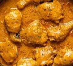 Smothered Chicken Quick and Creamy 3 Quick and creamy smothered chicken dish on a plate with garnishes