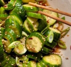 Spicy Cucumber Salad 3 Spicy cucumber salad with fresh ingredients and vibrant colors
