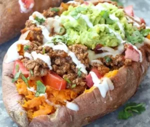 Taco Stuffed Sweet Potatoes Recipe - Whole30 Special Diet | High protein dinner sweet potato, High protein stuffed sweet potato, Stuffed sweet potato recipes beef 3 Taco stuffed sweet potatoes, a nutritious Whole30 recipe for high-protein dinner