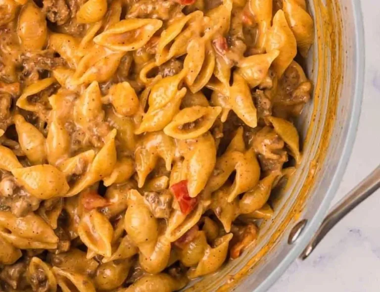 Cheesy taco pasta served in a bowl, a quick one pot meal recipe.