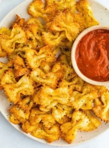 Crunchy Homemade Pasta Chips Recipe | Easy air fryer recipes snacks, Cool snacks, Noodle chips in air fryer 6 Crunchy homemade pasta chips made in an air fryer for a tasty snack.