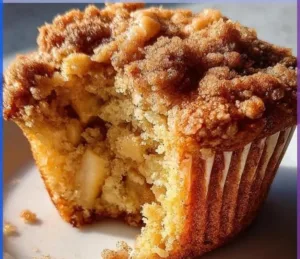 Delicious apple cinnamon breakfast bars on a wooden table, perfect for breakfast.