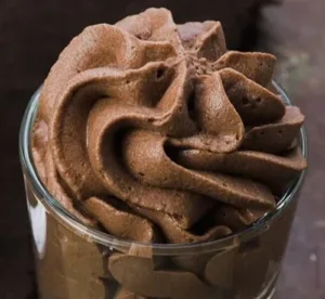 Quick and easy chocolate mousse dessert topped with chocolate shavings.