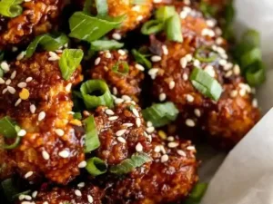 Crispy air fryer sesame cauliflower wings served with dipping sauce