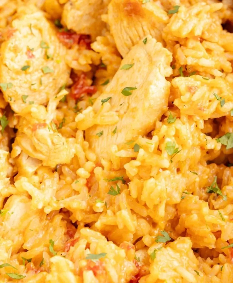 Easy one pot queso chicken with rice in a skillet