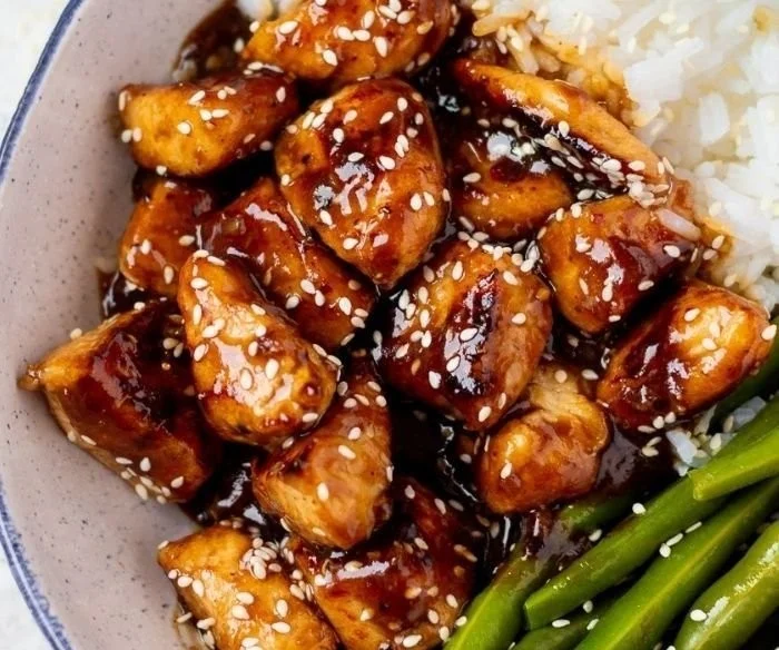 Home Loinzou 1 Healthy one pan sesame chicken dish with colorful vegetables and sesame seeds