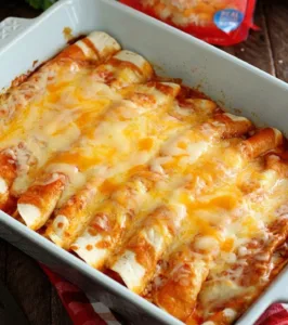 Simple 5-Ingredient Beef Enchiladas 5 Plate of simple 5-ingredient beef enchiladas topped with cheese and sauce