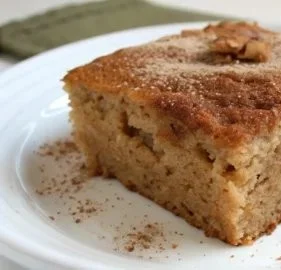 Simple Applesauce Snack Cake: Soft and Moist Everyday Treat 2 Soft and moist applesauce snack cake served on a plate with a fork