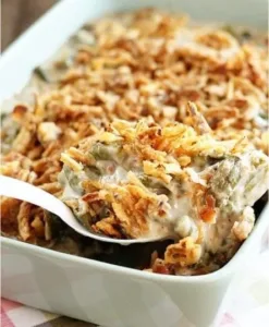 Simple Classic Green Bean Casserole 3 Simple Classic Green Bean Casserole served in a dish with crispy topping